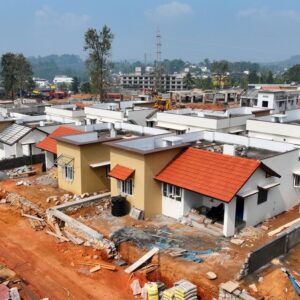 Mundakkai–Chooralmala disaster victims demand immediate second-phase housing allotment through government rehabilitation township lottery.