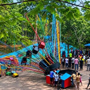 Rescue teams and injured visitors at an amusement park after a ride collapsed in Thiruvananthapuram.