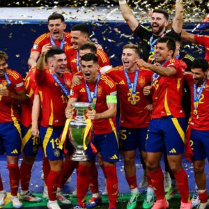 Spain players celebrate after defeating Argentina to win the FIFA World Cup 2026 final.